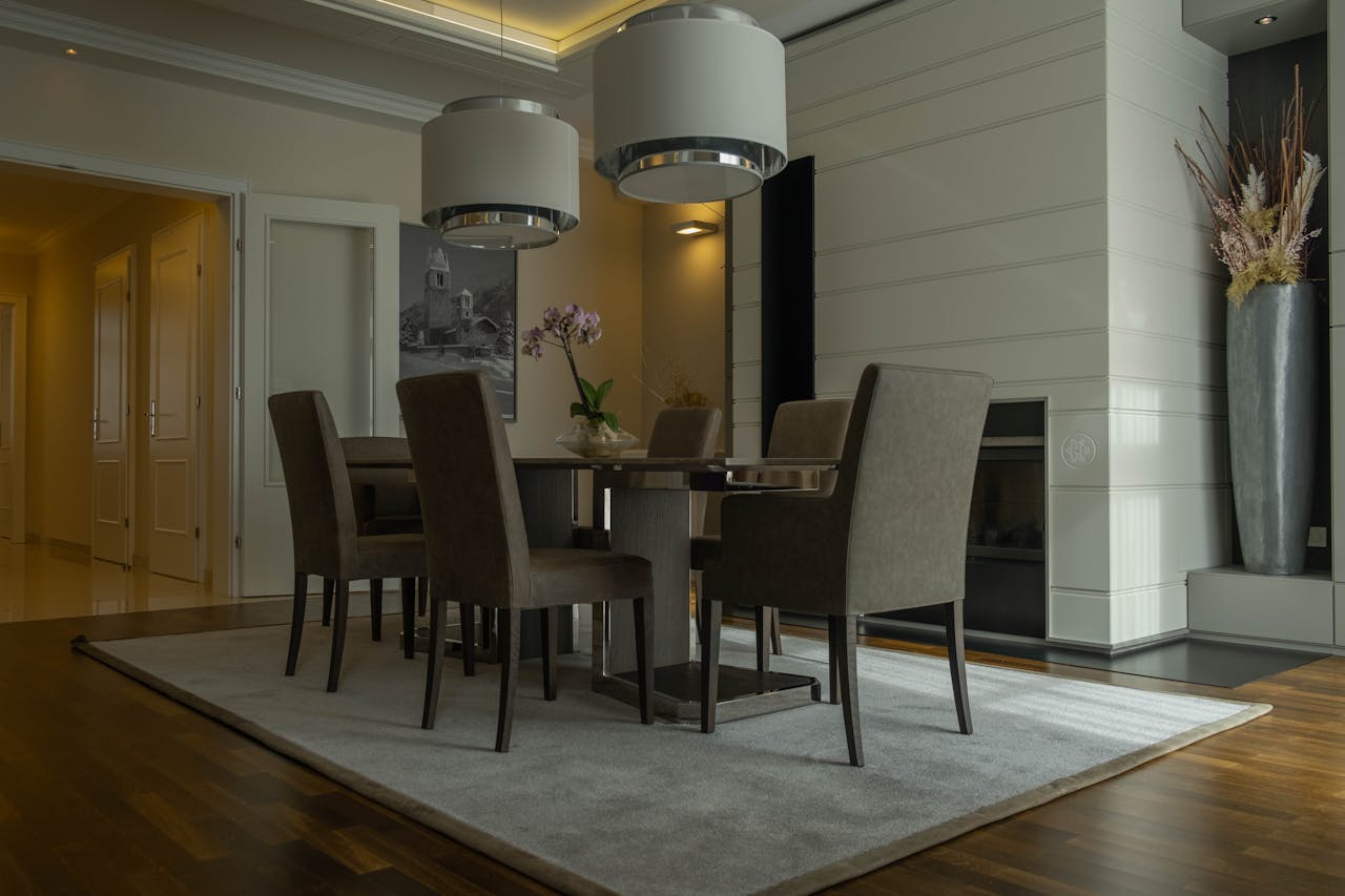 Stylish dining area with soft lighting, contemporary furniture, and a cozy feel.